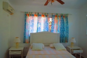 Beachfront villa with separate guesthouse in gated community