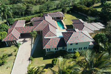 Beautifully designed mansion in select community close to the beach