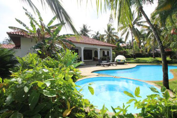 Lovely garden villa in a prestigious oceanfront community